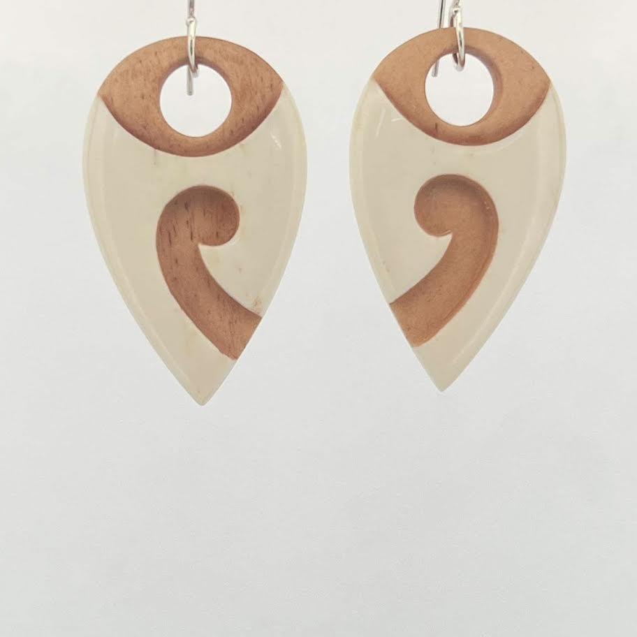 Two tone teardrop bone earrings lol I