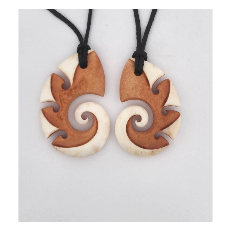 His And Hers Koru Pendants