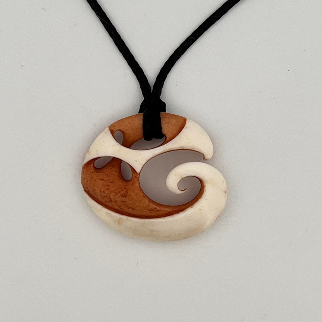 His And Hers Koru And Whanau Pendants