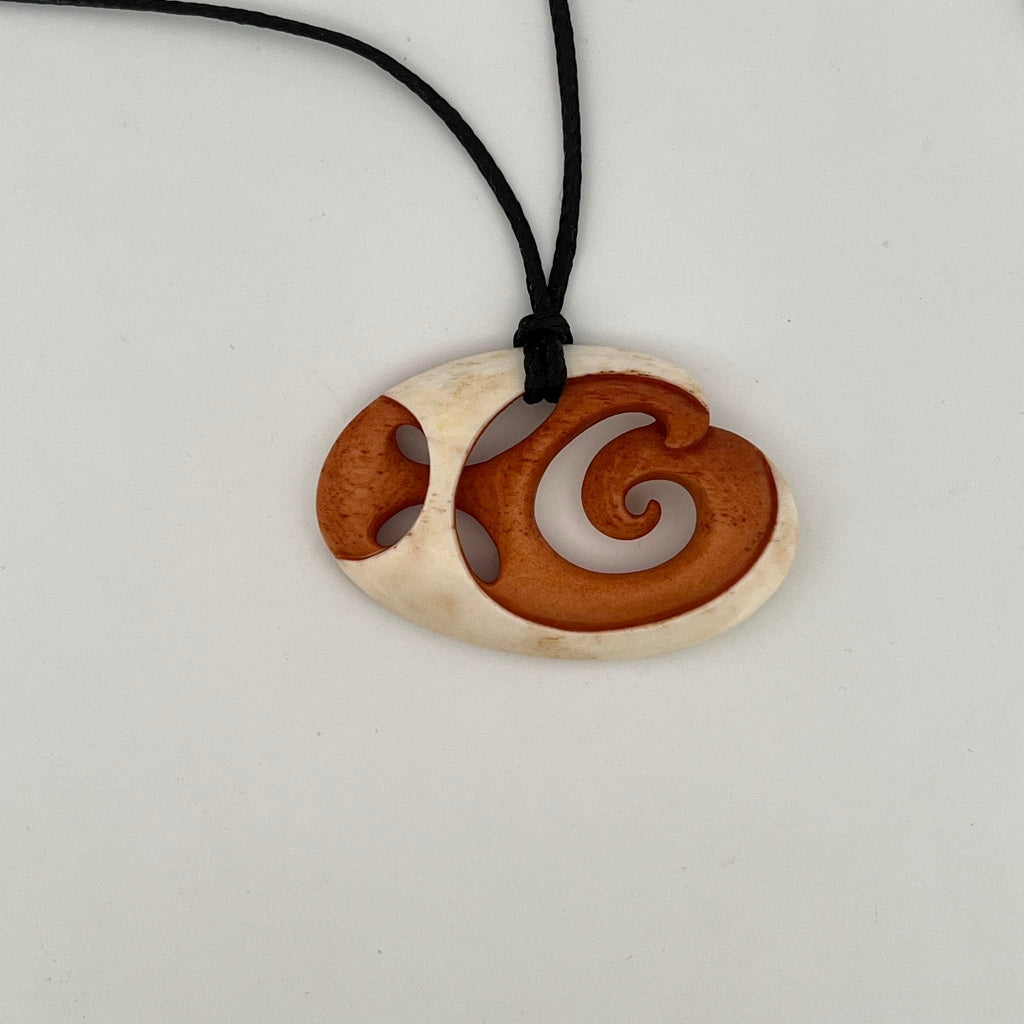 His And Hers Koru And Whanau Pendants