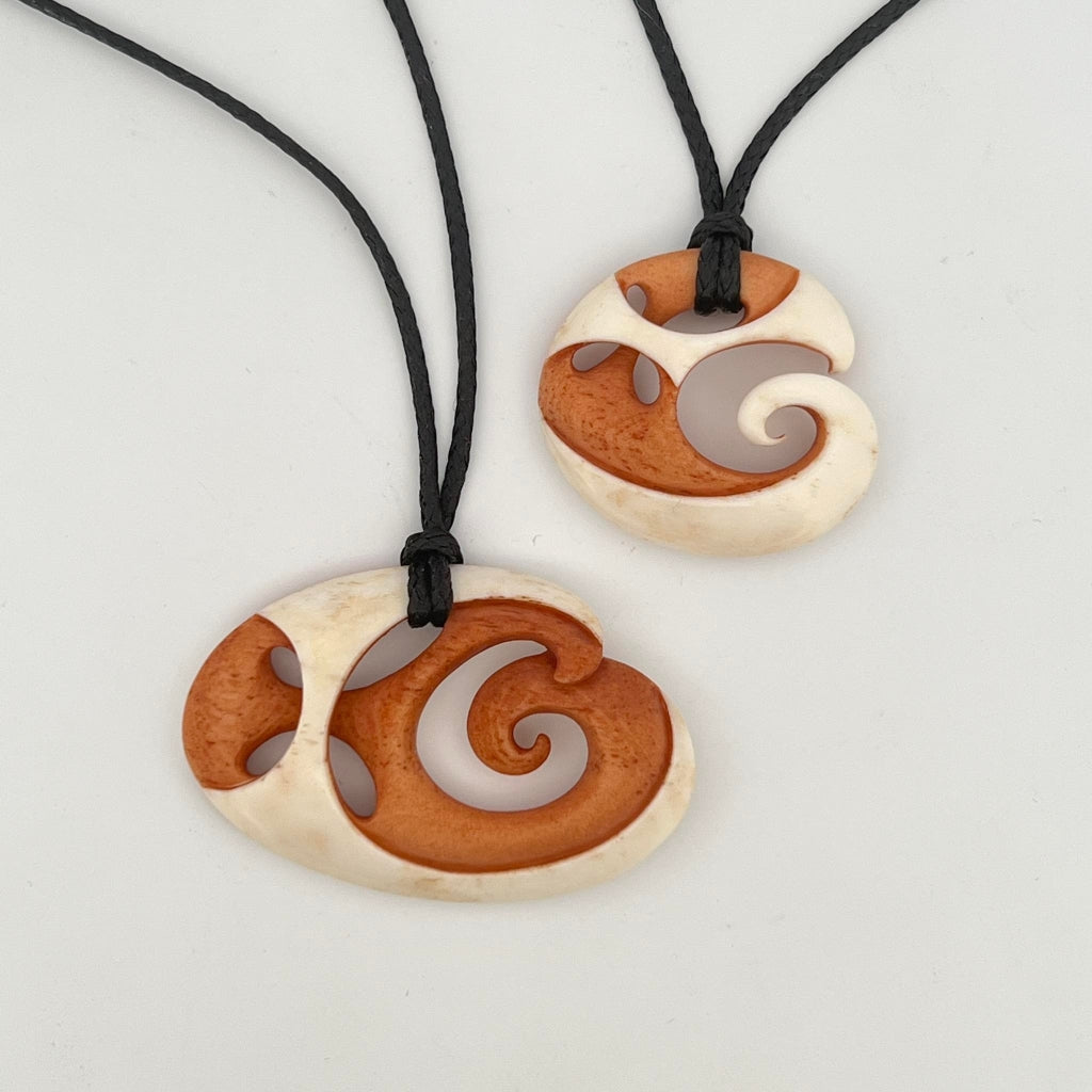 His And Hers Koru And Whanau Pendants